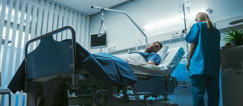 Picture of a patient in a hospital bed